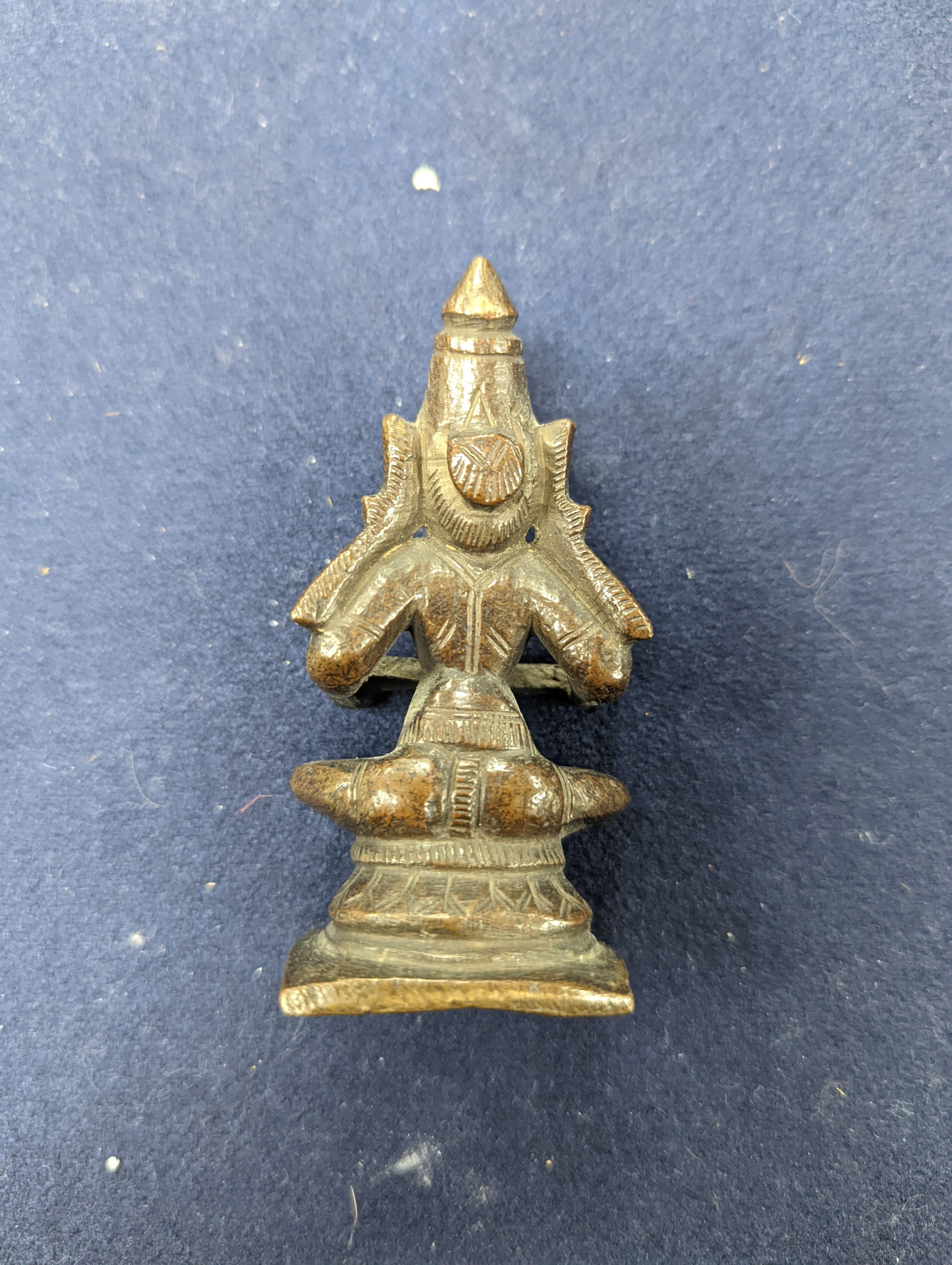 A Chinese gilt copper figure, a Chinese Dog of Fo, a bell, a censer, six Indian bronze figures and a scroll box